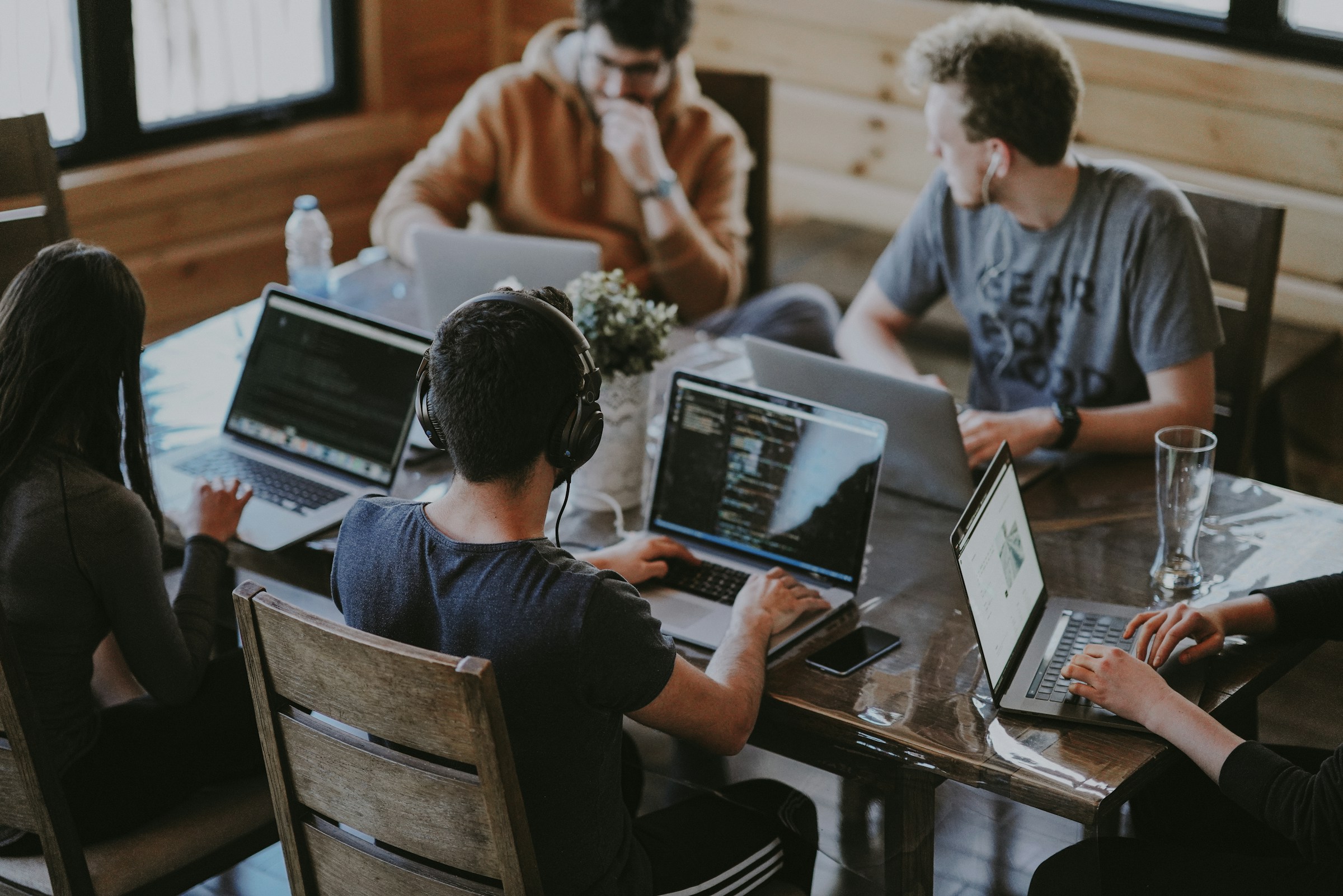 Diverse technology professionals collaborating in a modern workspace